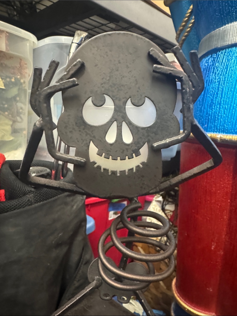 Black Skull Halloween decor.  Made by party lite.  Candle behind his head